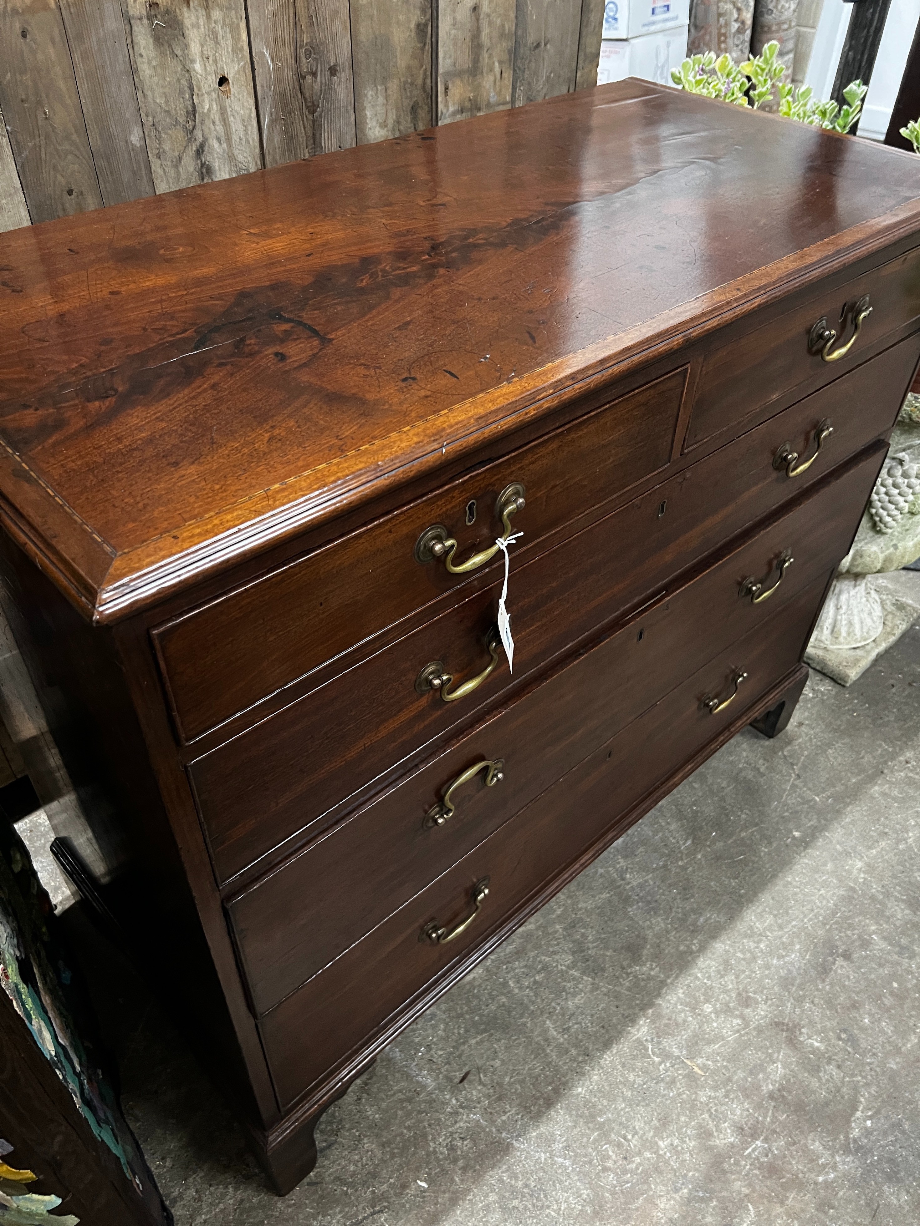 A George III inlaid mahogany chest, width 113cm, depth 55cm, height 98cm
